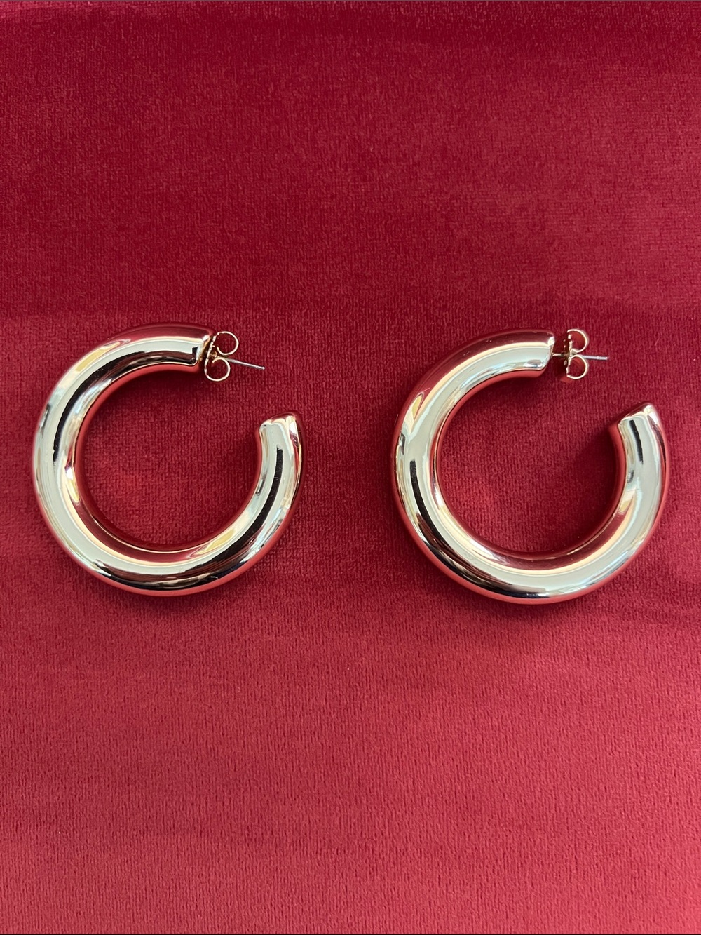 Janis Savitt - high polished rose gold plated hoop earrings